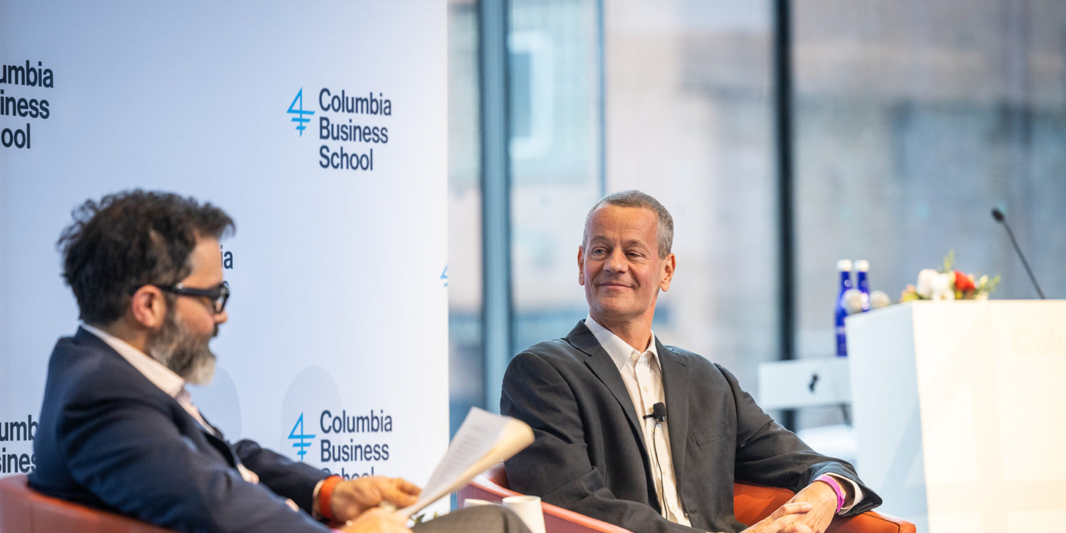 Mike Schuster on stage for AI in Finance DFI talk